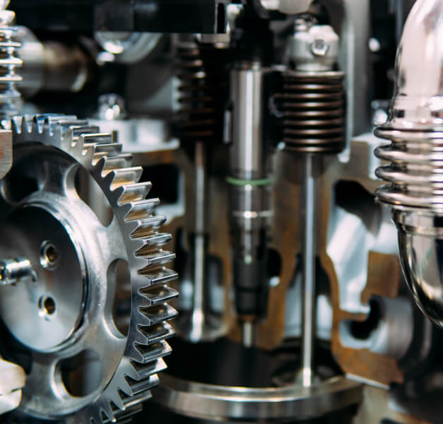 Diesel mechanic repairing a trucks' broken gearbox